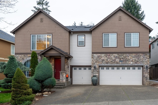 view of front of home with a garage