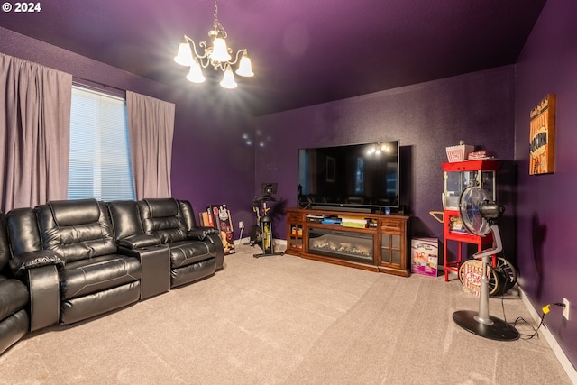 carpeted living room with an inviting chandelier