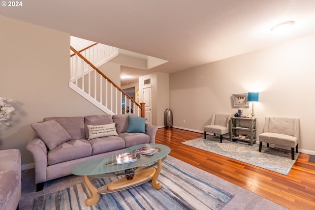 living room with hardwood / wood-style flooring