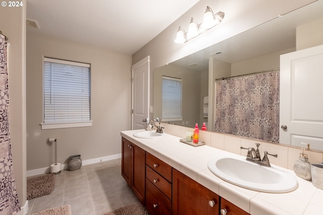 bathroom featuring vanity and tile patterned floors