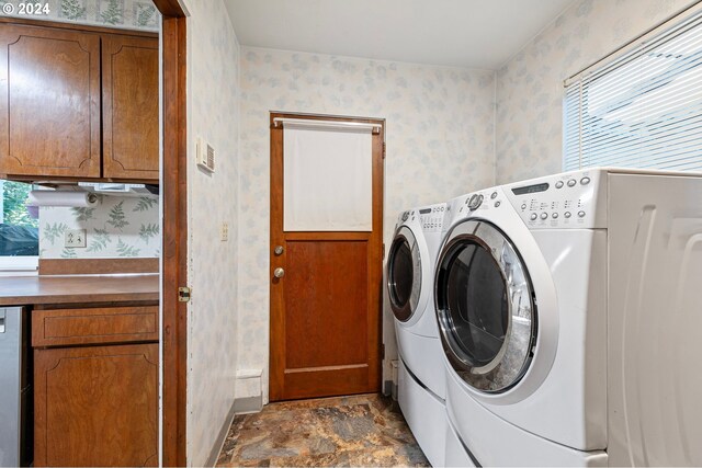 laundry area with cabinets and washer and dryer