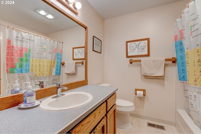 full bathroom featuring tile patterned floors, toilet, vanity, and shower / tub combo with curtain