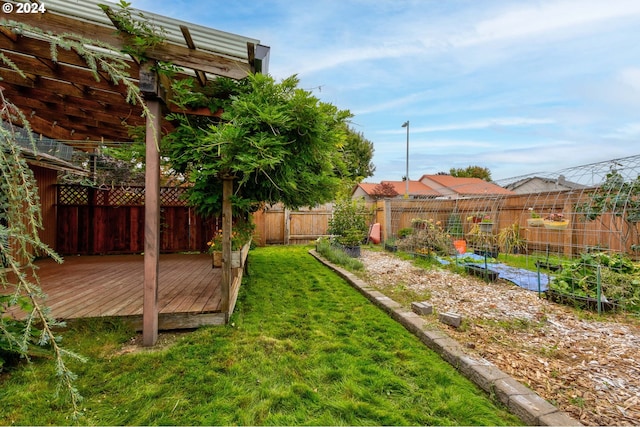 view of yard with a deck