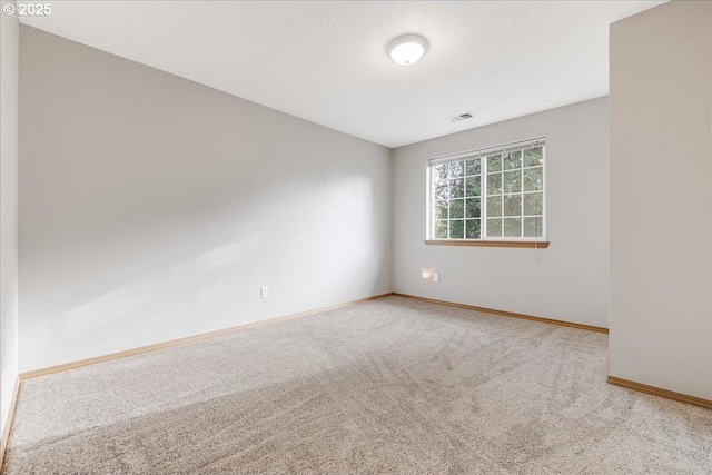 unfurnished room with carpet