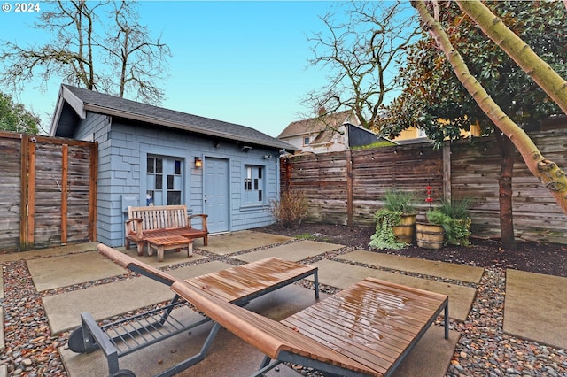 view of patio with an outdoor structure