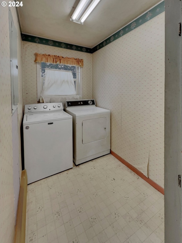 washroom with washer and dryer