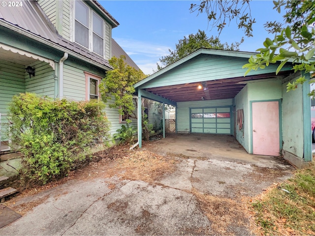 garage with a carport