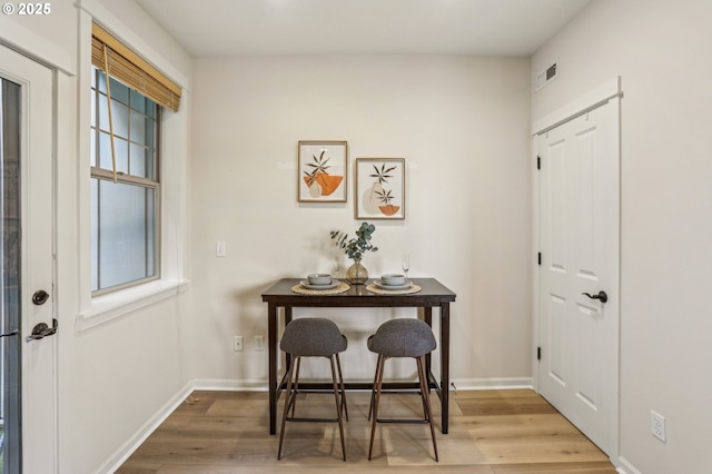 dining room featuring hardwood / wood-style floors