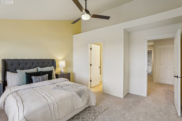 carpeted bedroom featuring ceiling fan and lofted ceiling