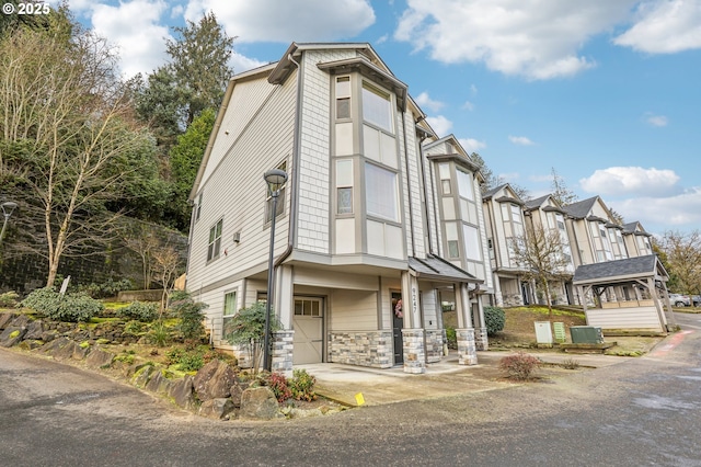 view of property with central AC unit