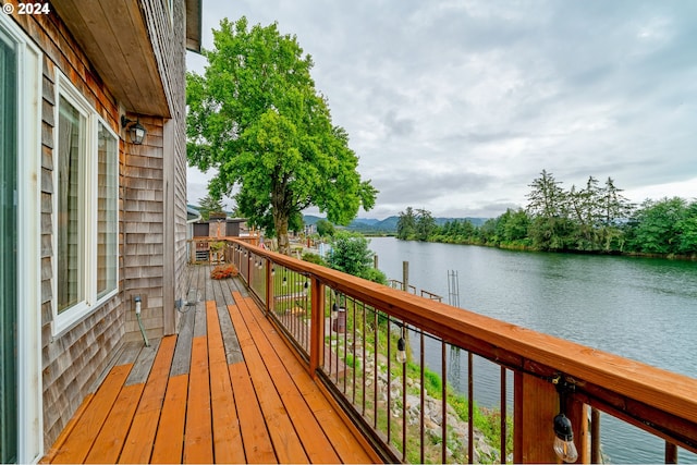 deck featuring a water view