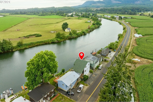 aerial view featuring a rural view and a water view