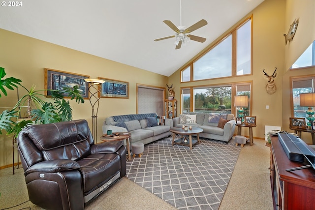 carpeted living room featuring high vaulted ceiling and ceiling fan