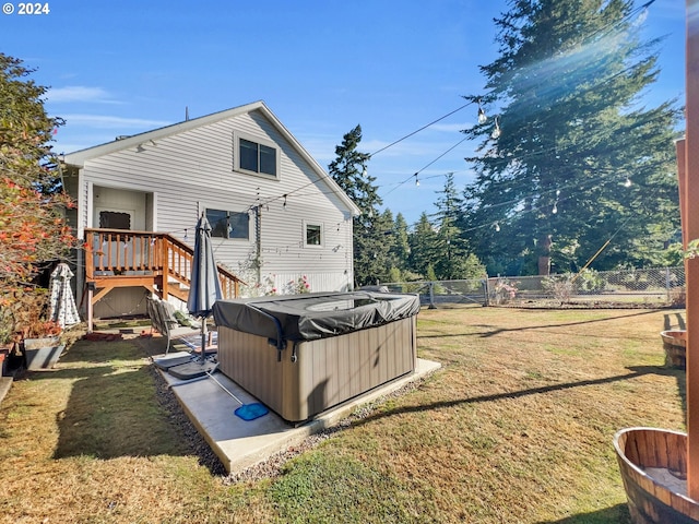 back of house featuring a lawn