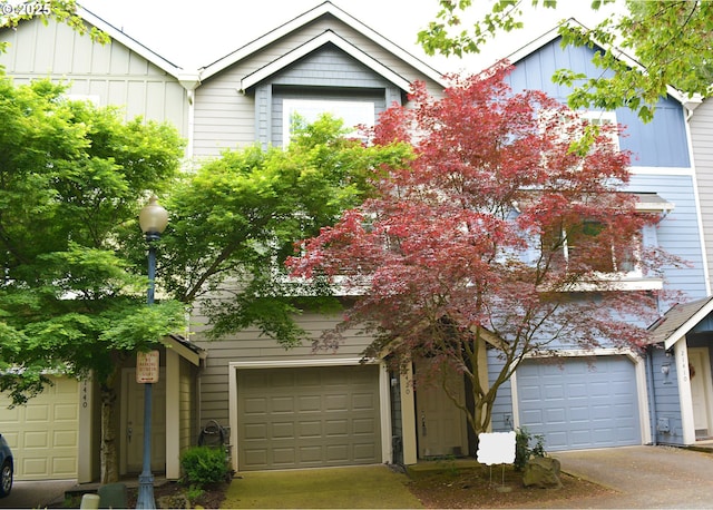 view of front facade featuring board and batten siding and driveway