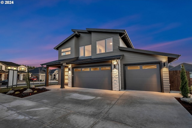 view of front of property featuring a garage