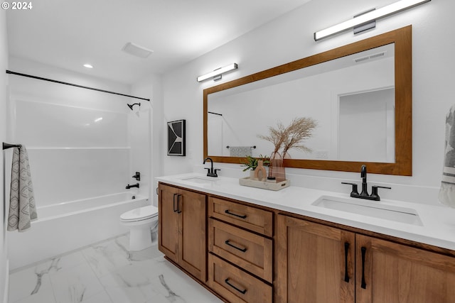 full bathroom featuring vanity, toilet, and shower / washtub combination