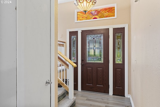 view of exterior entry with stucco siding