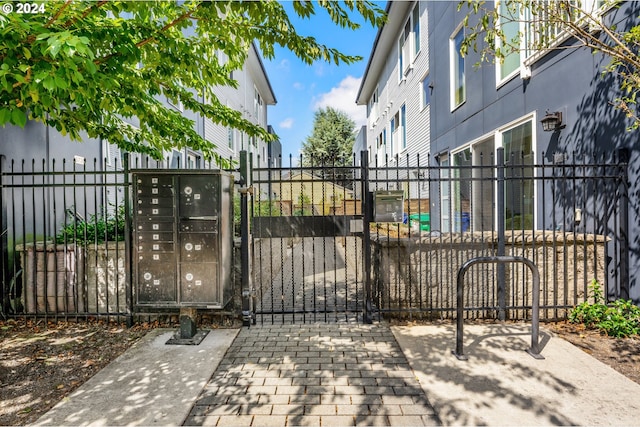 view of gate featuring fence