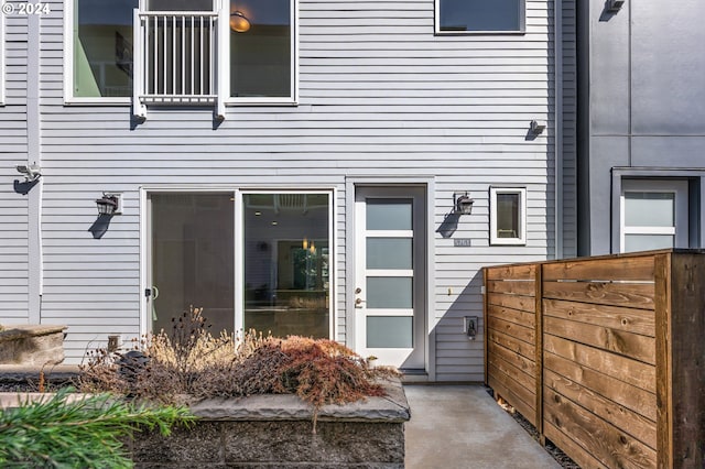 property entrance with fence