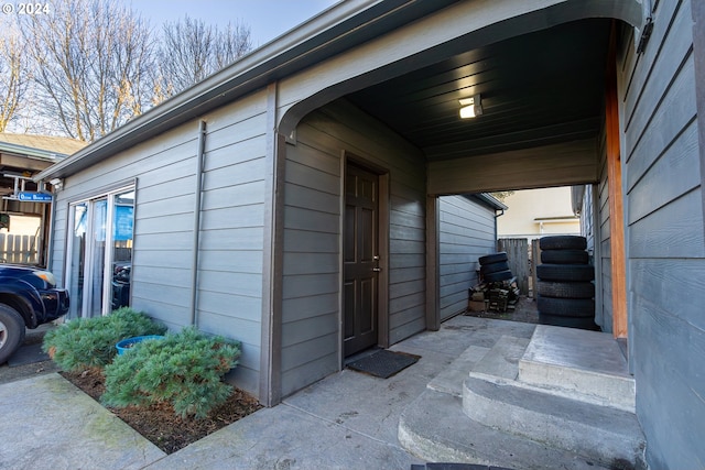 exterior space with a carport