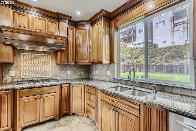 14815 SE Donley Ln, Happy Valley, OR 97086 - kitchen with stainless steel appliances, a sink, stone counters, and brown cabinets