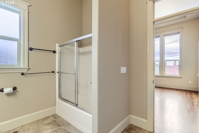 14815 SE Donley Ln, Happy Valley, OR 97086 - bathroom with baseboards and enclosed tub / shower combo