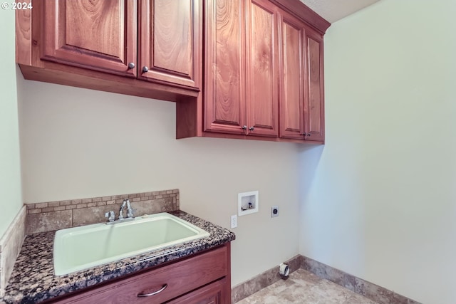 laundry area featuring washer hookup, hookup for an electric dryer, cabinets, and sink