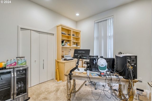 home office featuring light colored carpet and beverage cooler