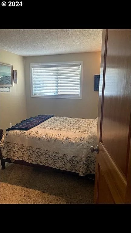 bedroom featuring a textured ceiling