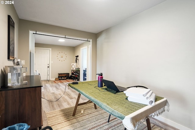 home office featuring hardwood / wood-style floors