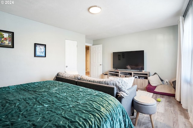 bedroom featuring hardwood / wood-style floors