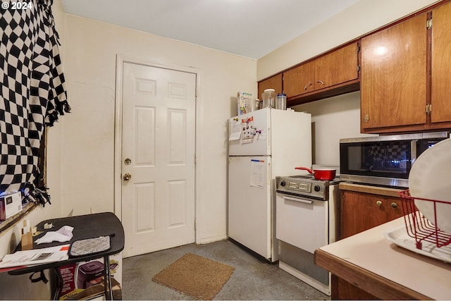 kitchen featuring white fridge