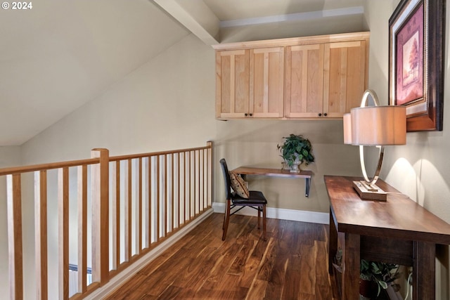 office featuring dark hardwood / wood-style floors and vaulted ceiling