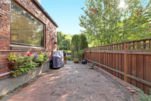 view of patio featuring area for grilling and a fenced backyard