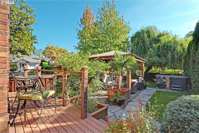 wooden deck with a vegetable garden and an outdoor hangout area