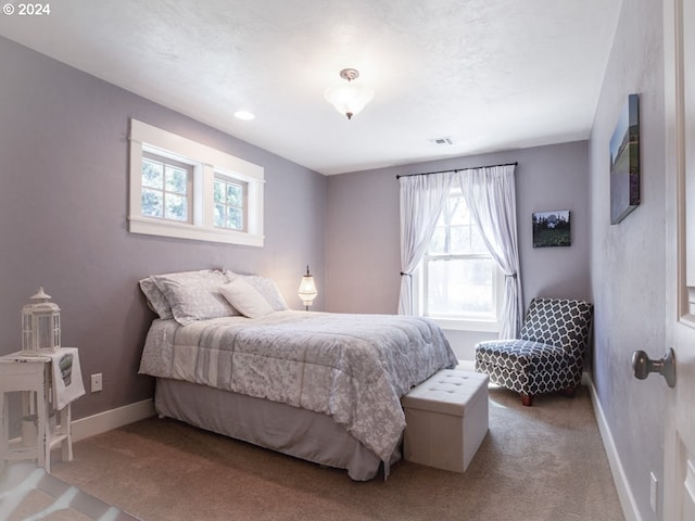 bedroom featuring carpet flooring