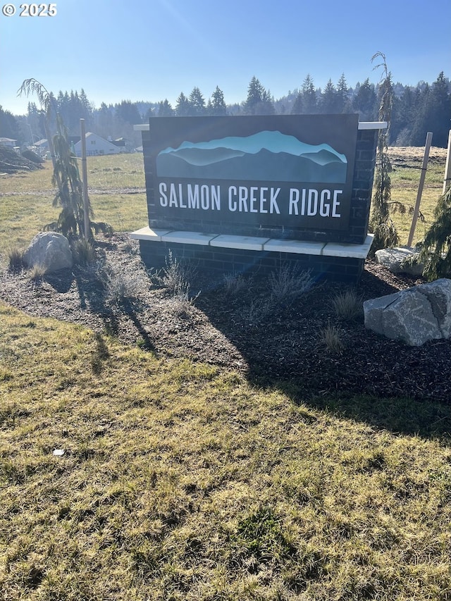 community sign featuring a rural view