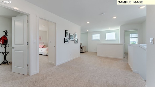 empty room featuring carpet floors, recessed lighting, and baseboards