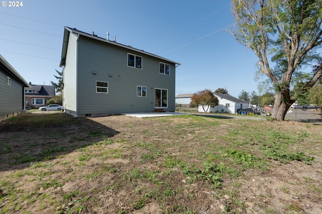 rear view of house with a patio area