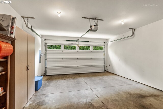 garage featuring a garage door opener