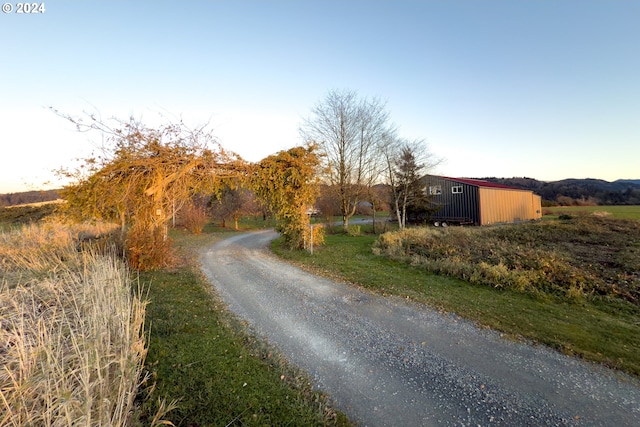 view of road featuring a rural view