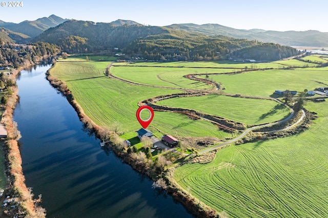 bird's eye view with a water and mountain view and a rural view