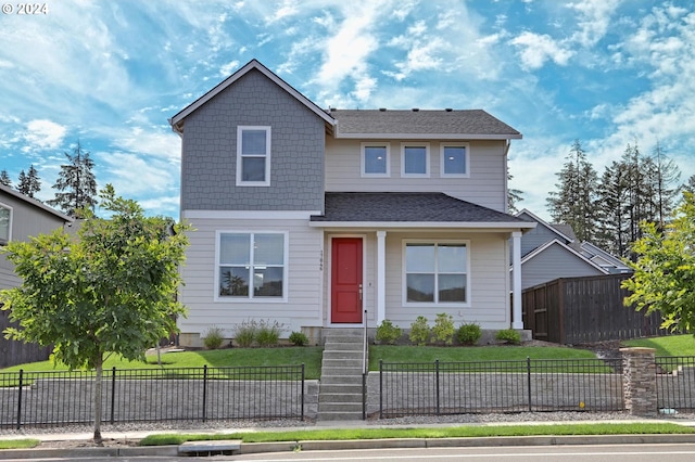 view of front property with a front lawn