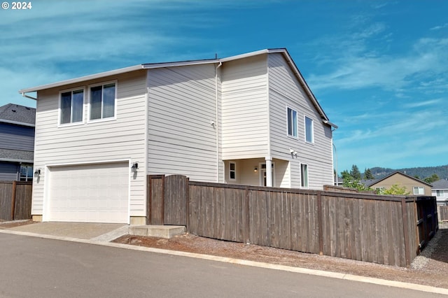 view of home's exterior featuring a garage