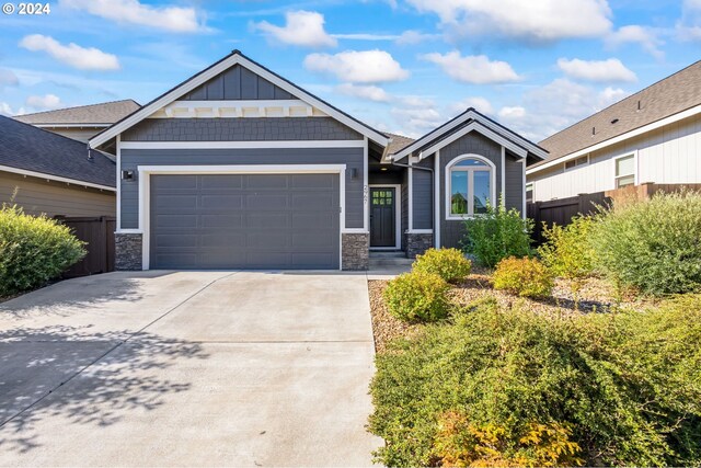 craftsman-style house featuring a garage