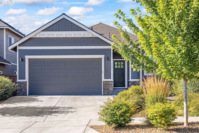 craftsman inspired home featuring a garage