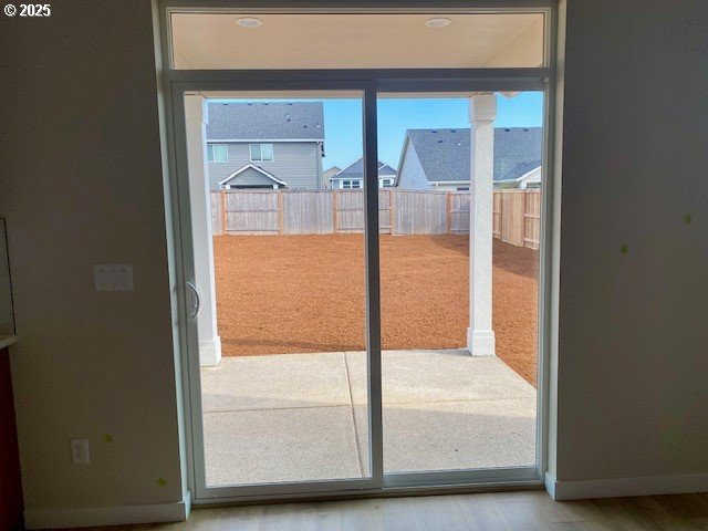 doorway with baseboards