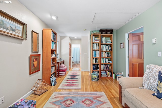 sitting room featuring light wood-type flooring