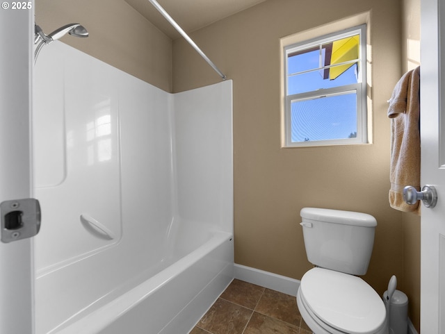 bathroom featuring tile patterned floors and toilet